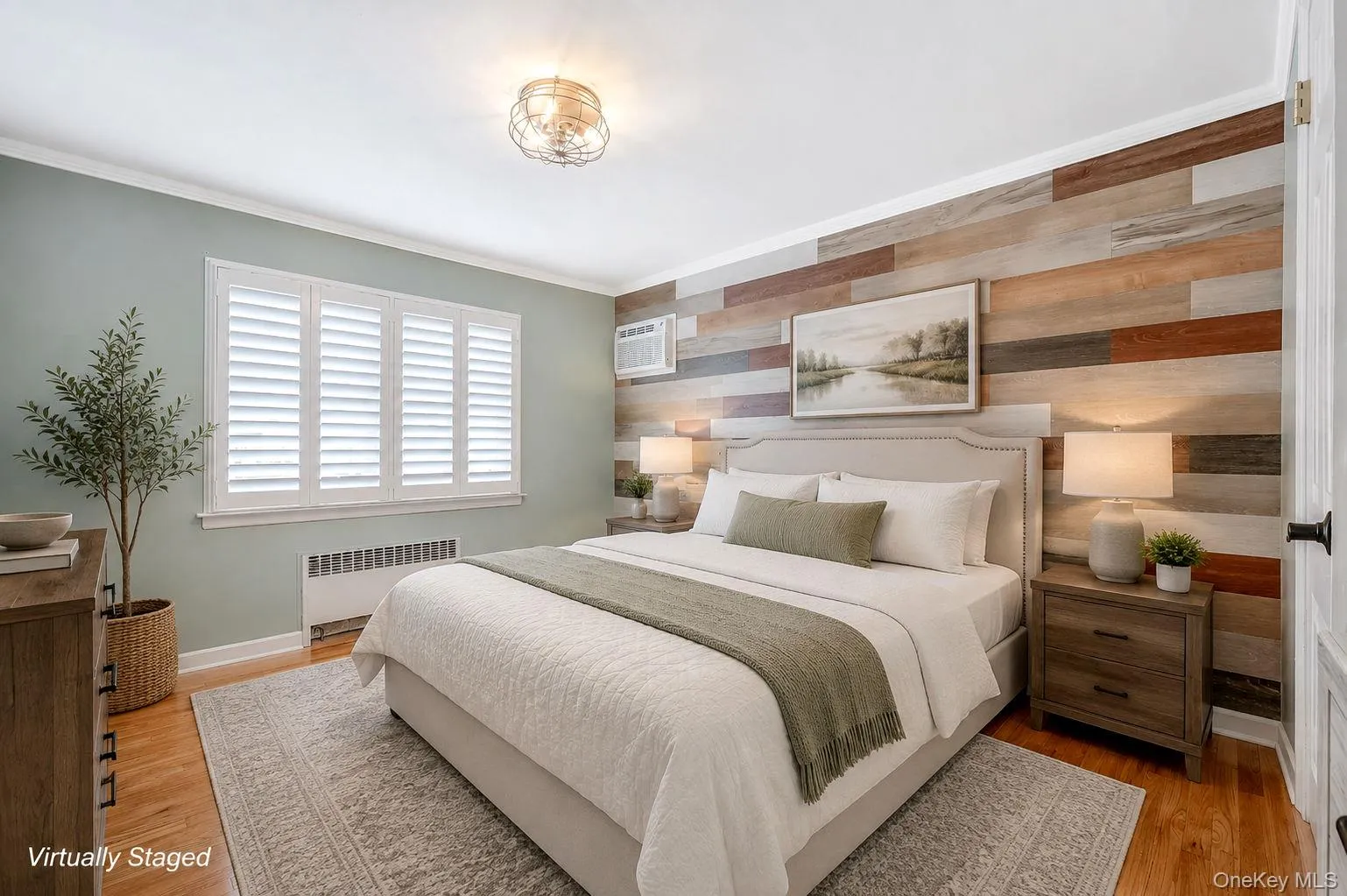 Bedroom 1. First Floor. Hardwood floor. Virtually Staged. Bedroom 1. First Floor. Hardwood floor. Virtually Staged.