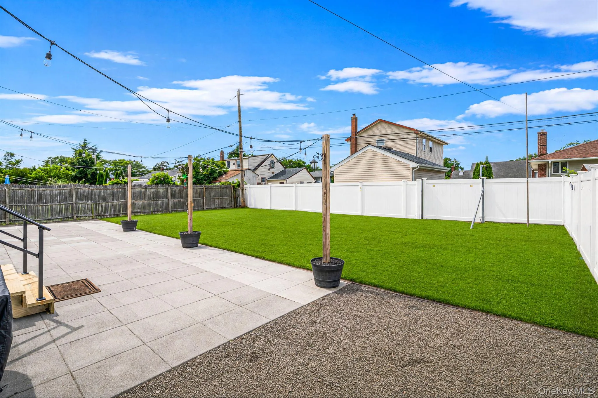 Backyard Patio and Bluestone rock gardens. Lawn digitally enhanced. Backyard Patio and Bluestone rock gardens. Lawn digitally enhanced.