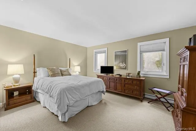 Wall-to-wall carpeting, dual windows with white trim, and neutral wall tones Wall-to-wall carpeting, dual windows with white trim, and neutral wall tones