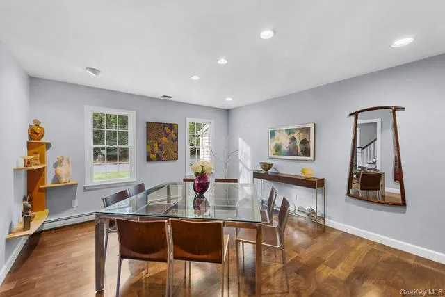 Wood-finish flooring, two windows. Wood-finish flooring, two windows.
