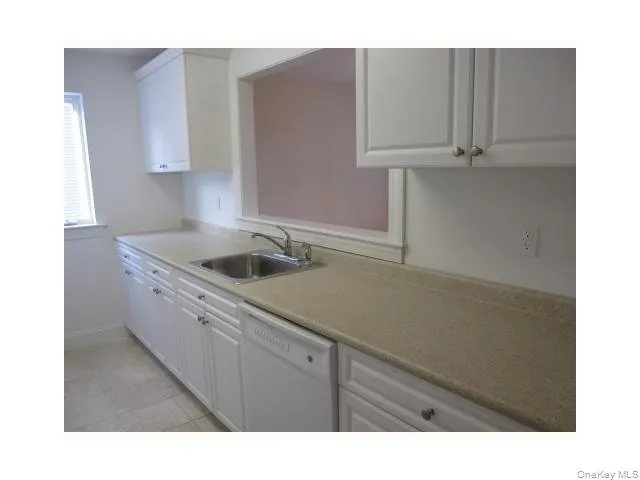 The galley kitchen has lots of cabinets and counterspace, and a pantry too! The galley kitchen has lots of cabinets and counterspace, and a pantry too!