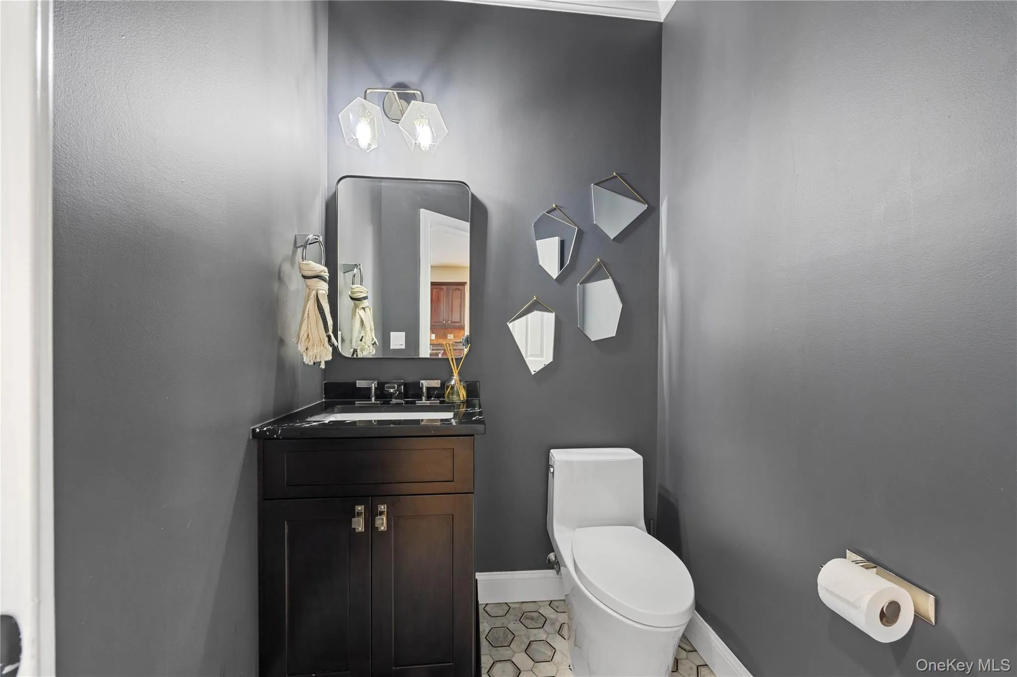 Bathroom with vanity and light tile patterned flooring Bathroom with vanity and light tile patterned flooring