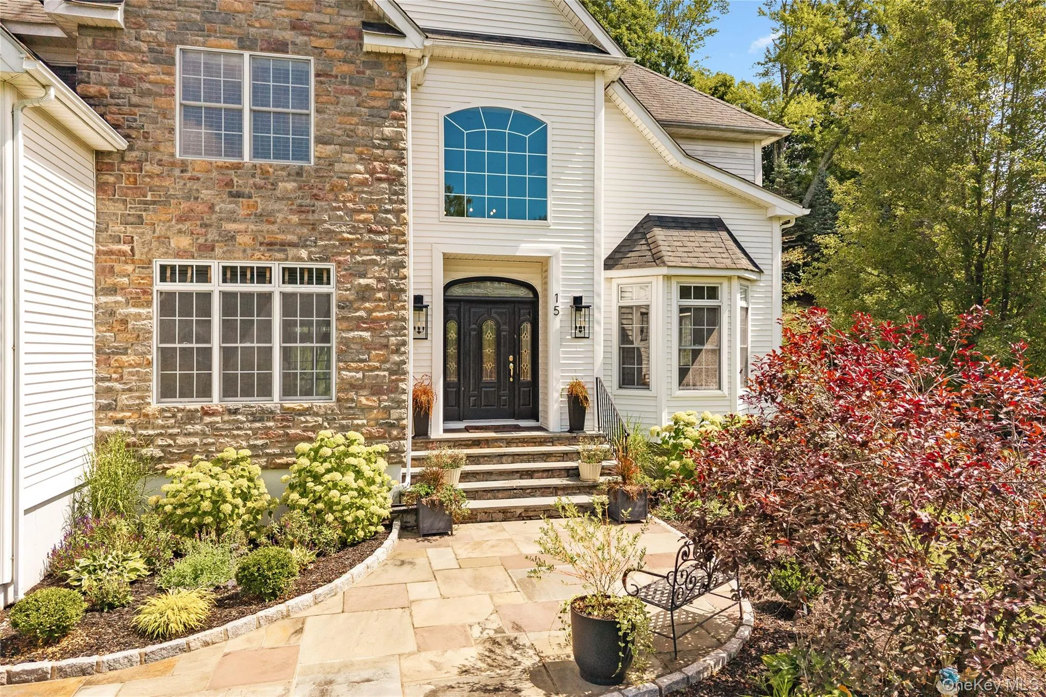 View of front of house with stone siding View of front of house with stone siding