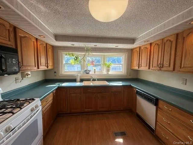 range, fridge, microwave, dishwasher and can opener range, fridge, microwave, dishwasher and can opener