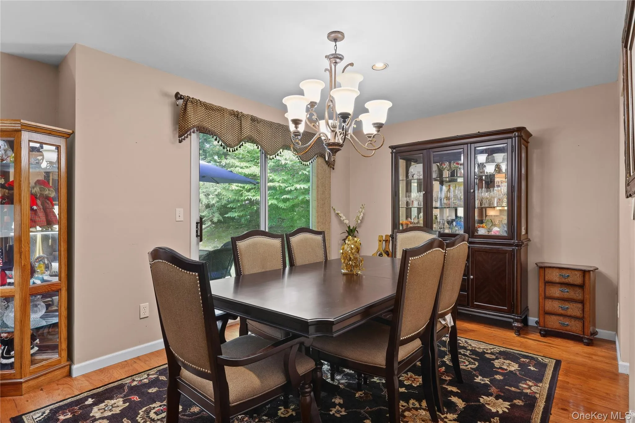 Dining Room with Sliding Glass door out to ground level patio. Dining Room with Sliding Glass door out to ground level patio.