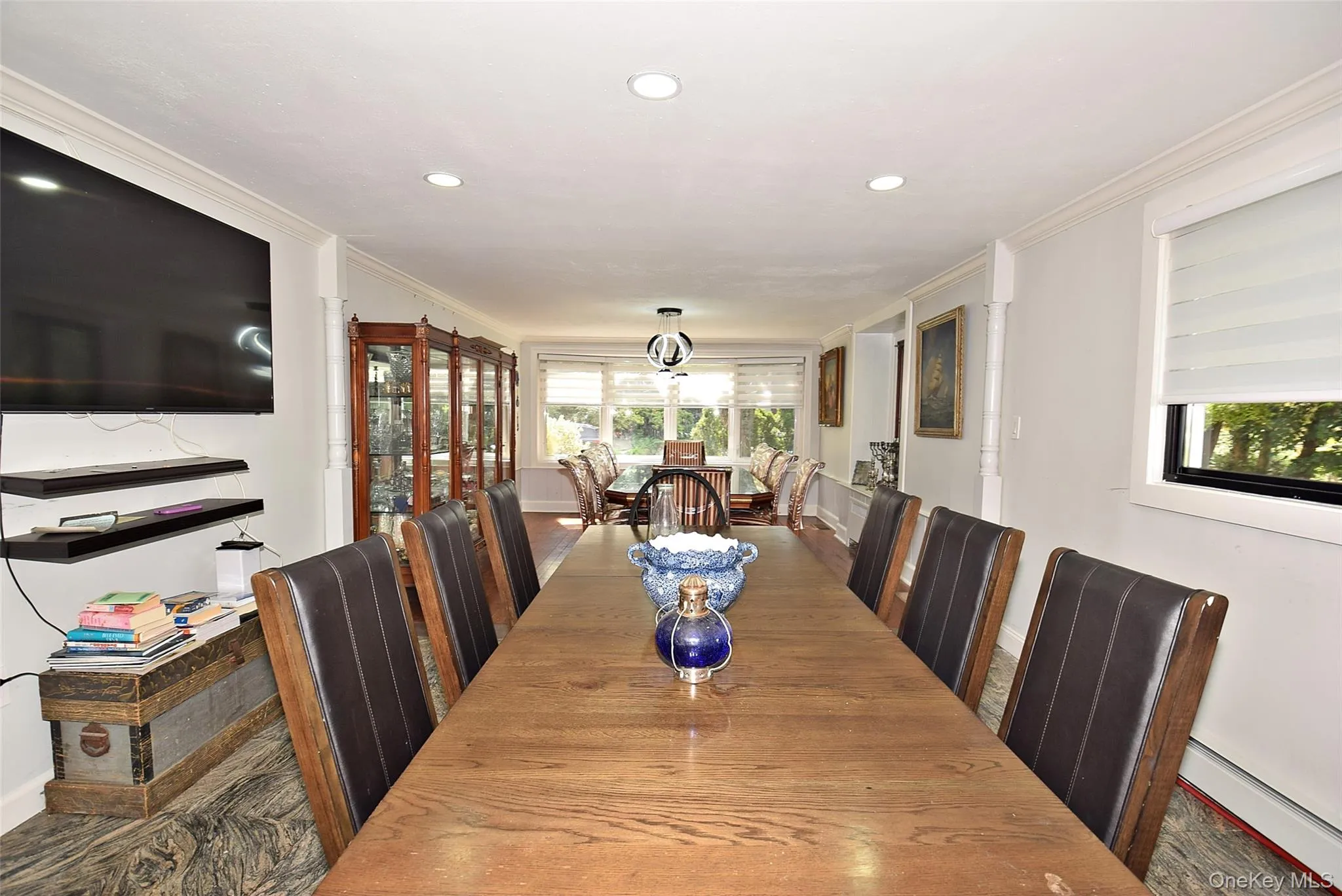Recessed lighting, crown molding, wood-finish flooring, multiple windows, built-in display cabinetry Recessed lighting, crown molding, wood-finish flooring, multiple windows, built-in display cabinetry
