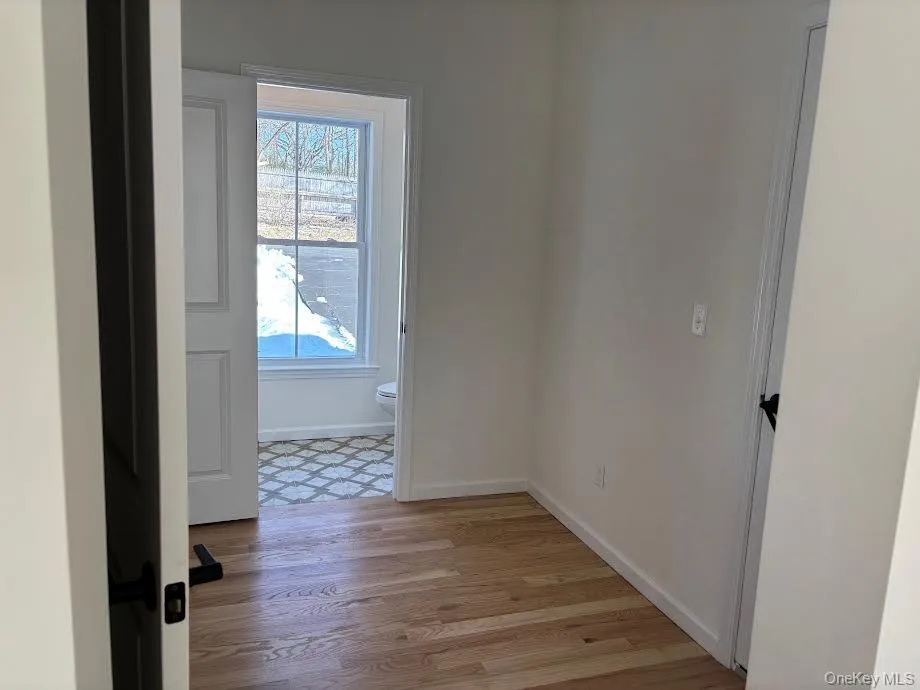 Unfurnished room with light hardwood / wood-style flooring Unfurnished room with light hardwood / wood-style flooring