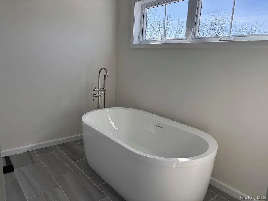 Bathroom with a washtub Bathroom with a washtub