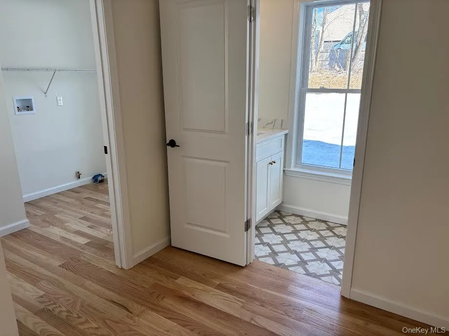 Bathroom with hardwood / wood-style floors Bathroom with hardwood / wood-style floors