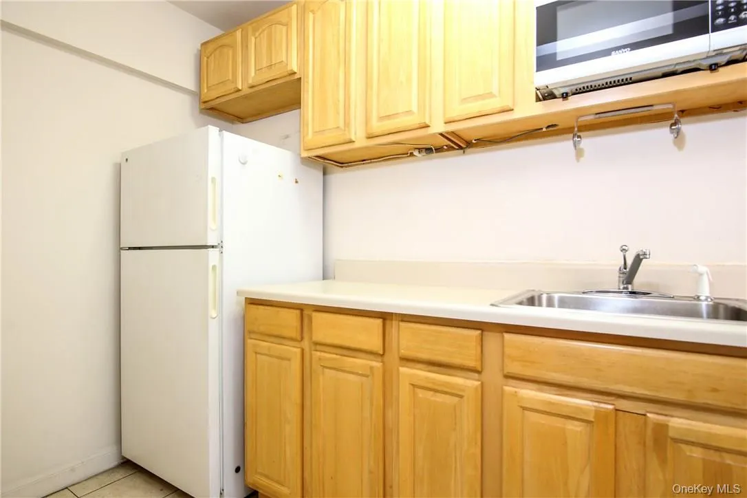 Here is a second view of the kitchen from the other end. Here is a second view of the kitchen from the other end.