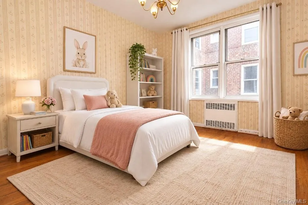 Photo Visually Staged. The second bedroom has hardwood floors and is approx 12'-4" x 9'-8". Photo Visually Staged. The second bedroom has hardwood floors and is approx 12'-4" x 9'-8".