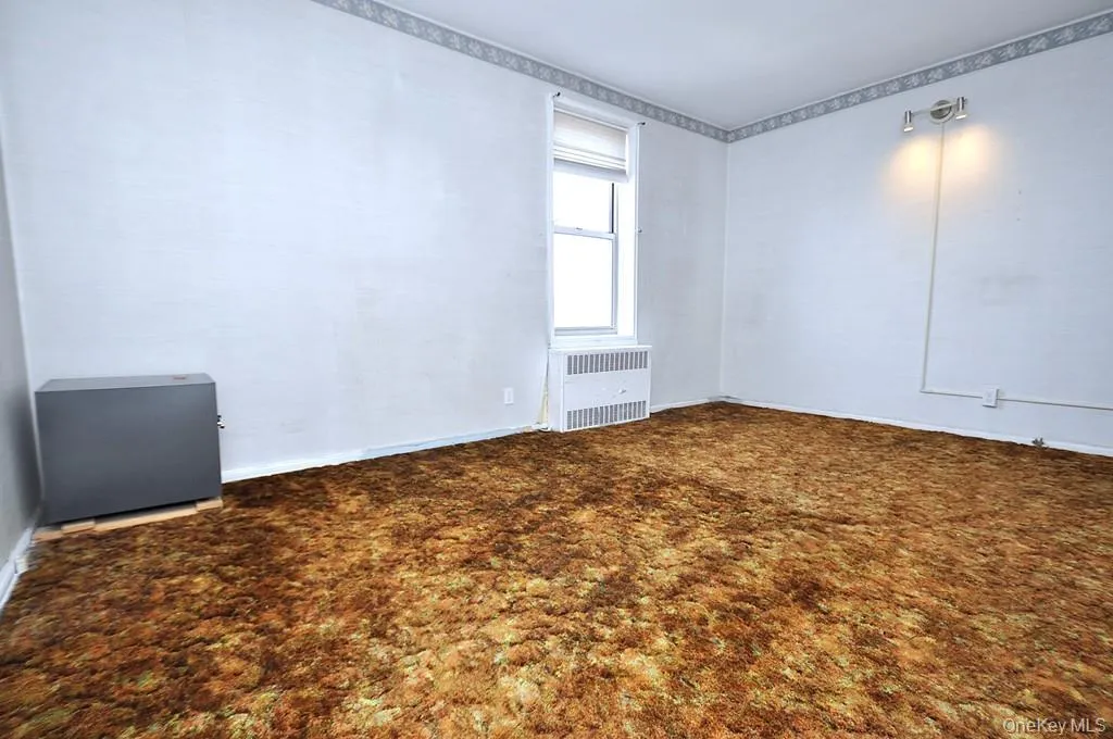 The primary bedroom is a corner room with Hudson River views and covered hardwood floors. The bedroom is approx. 15'-8" x 14' -3". The primary bedroom is a corner room with Hudson River views and covered hardwood floors. The bedroom is approx. 15'-8" x 14' -3".