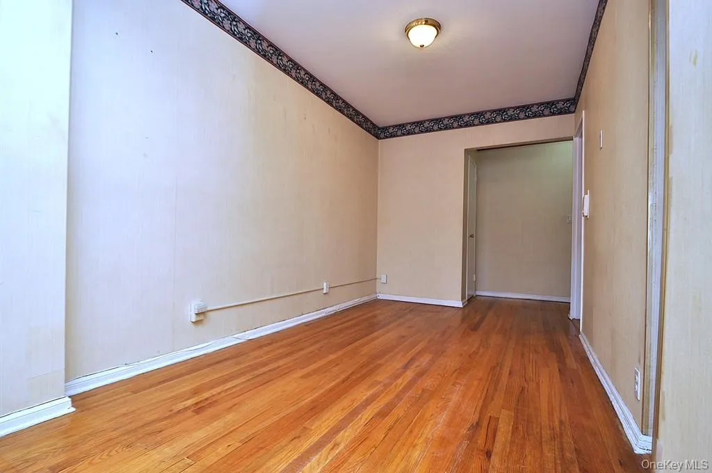 The dining area opens to the living room and has hardwood floors. The dining area is approx. 13'-0" x 8'-3". The dining area opens to the living room and has hardwood floors. The dining area is approx. 13'-0" x 8'-3".