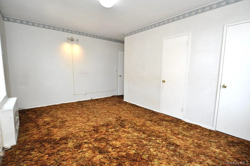 The primary bedroom is a corner room with Hudson River views and covered hardwood floors. The bedroom is approx. 15'-8" x 14' -3". The primary bedroom is a corner room with Hudson River views and covered hardwood floors. The bedroom is approx. 15'-8" x 14' -3".
