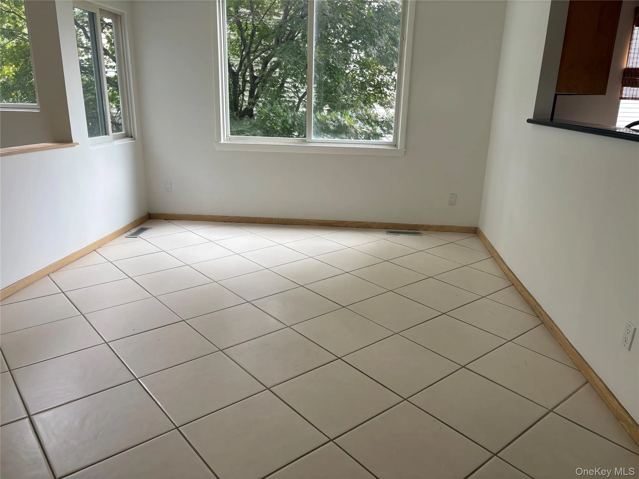 Dining Room has pass-through window to the kitchen Dining Room has pass-through window to the kitchen