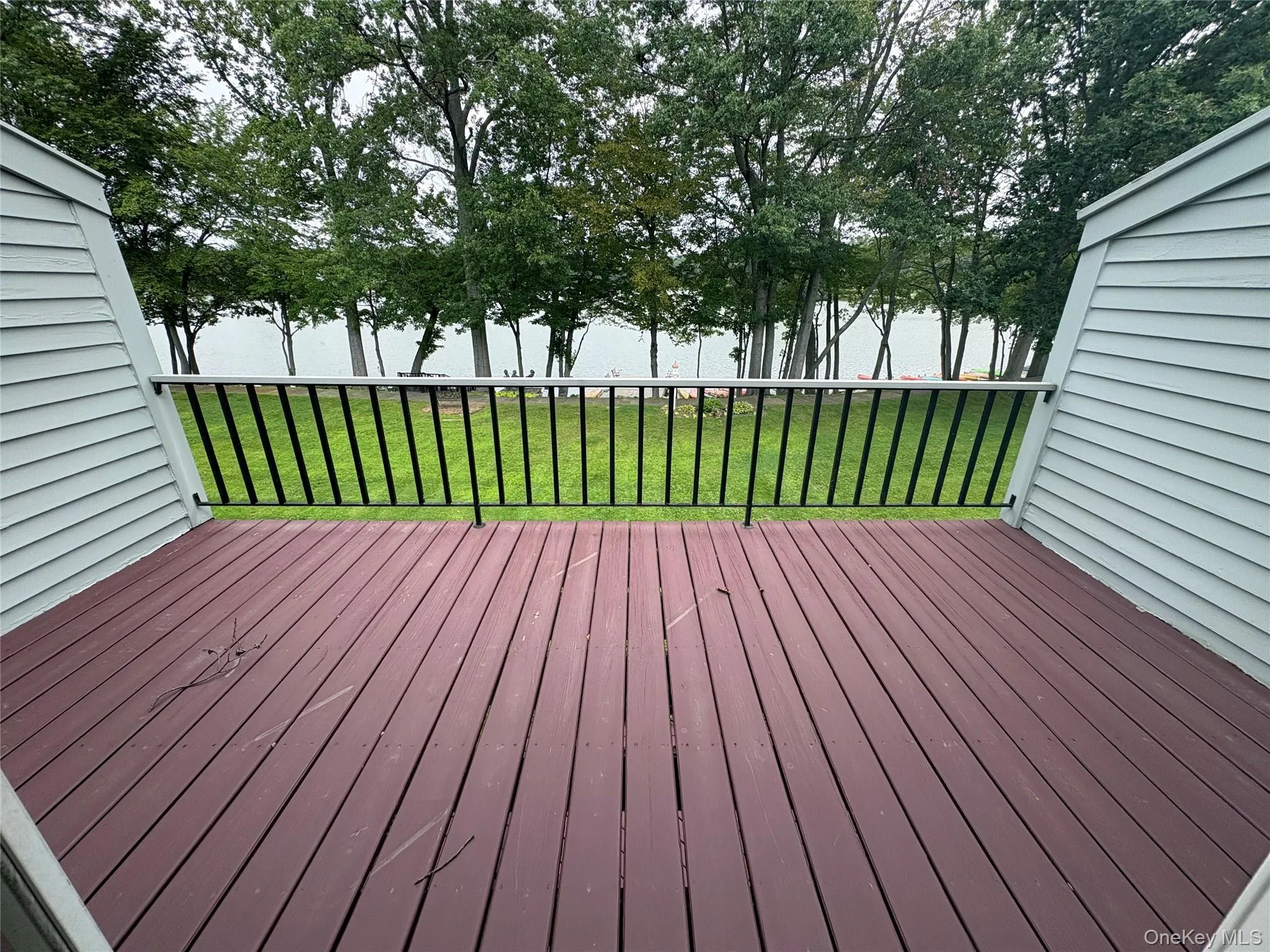 Primary Bedroom has private balcony overlooking the lake Primary Bedroom has private balcony overlooking the lake