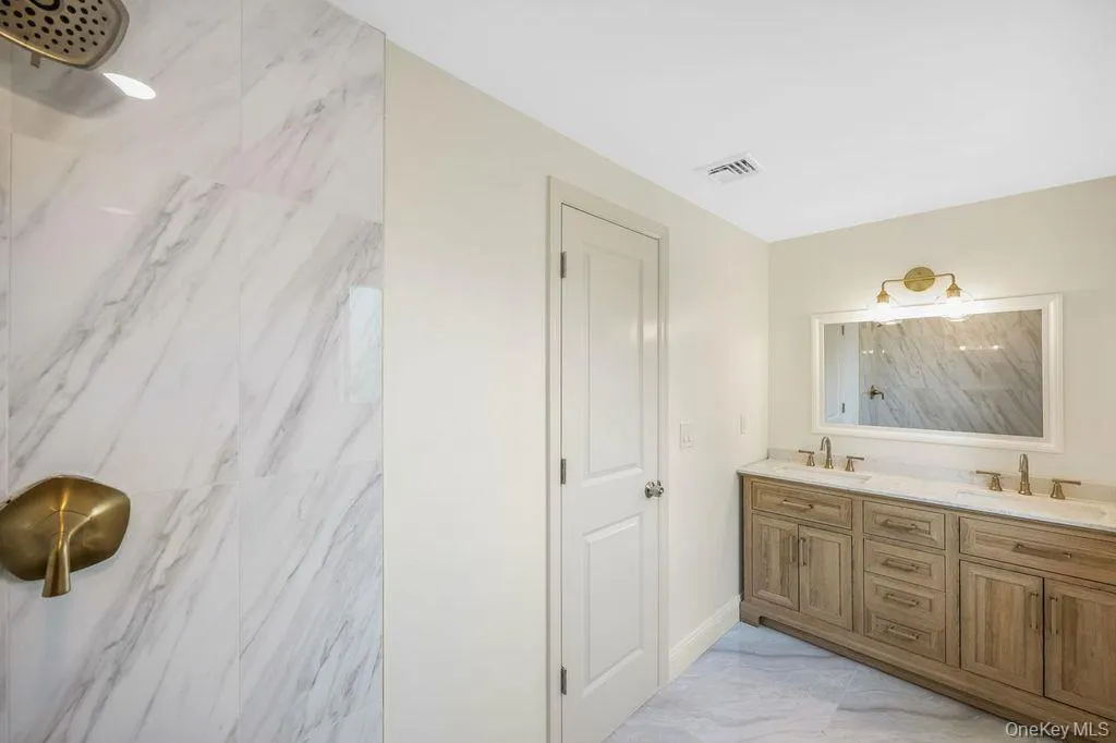 2nd level ensuite- Primary Bathroom Double Vanity and Shower 2nd level ensuite- Primary Bathroom Double Vanity and Shower