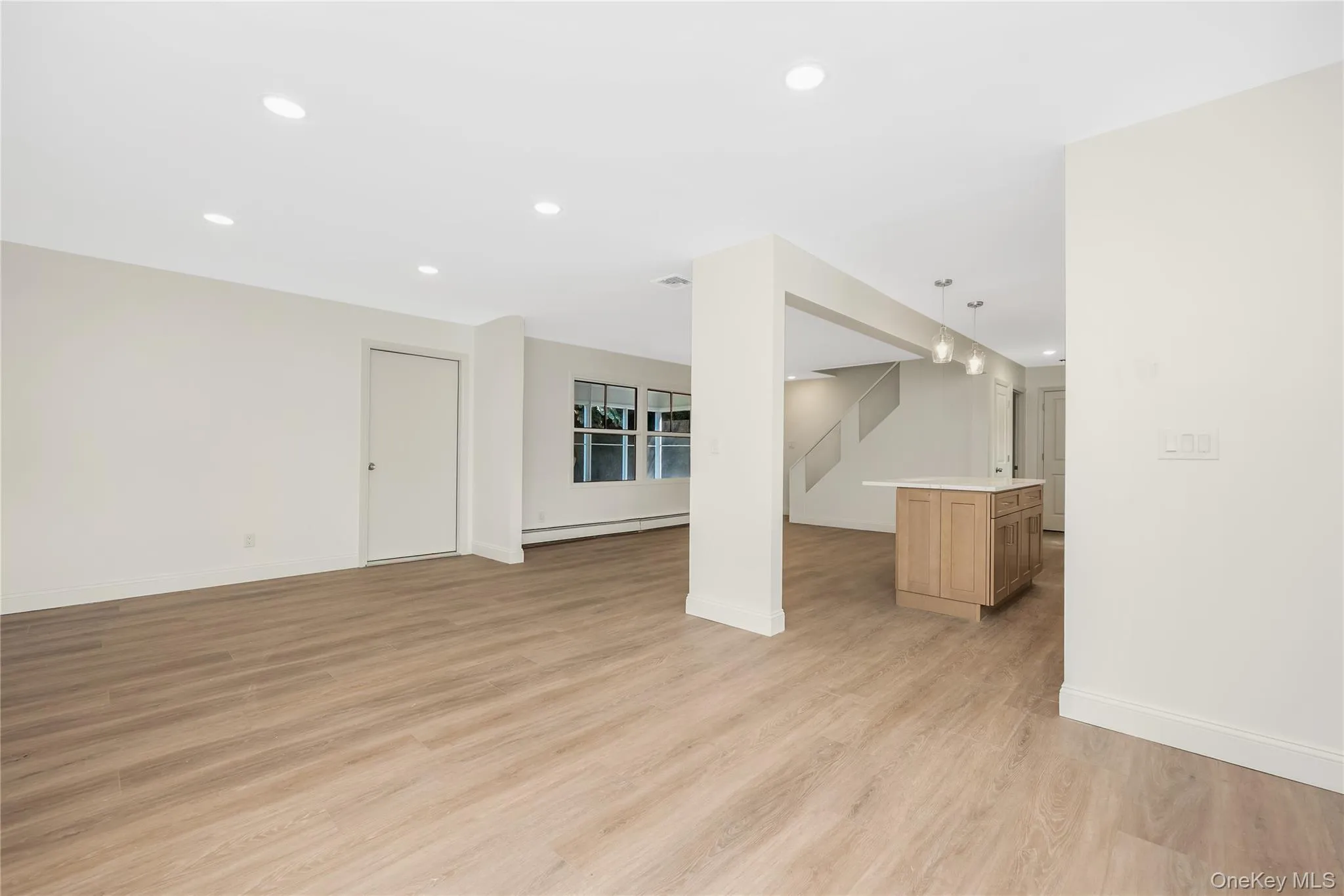 Open floor plan area LR/DR view into kitchen Open floor plan area LR/DR view into kitchen