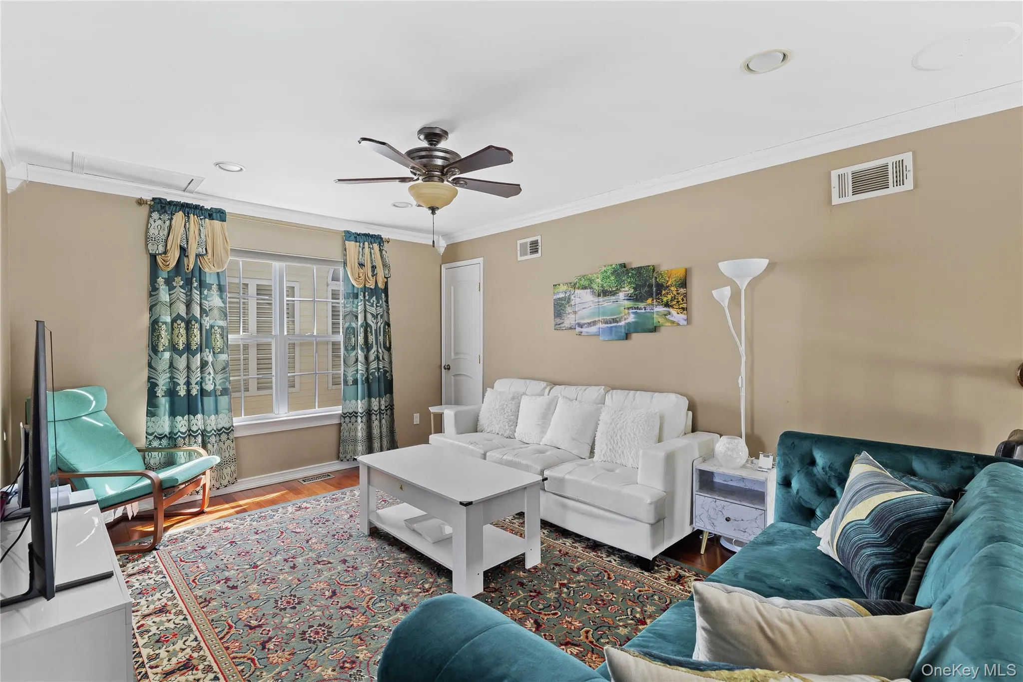 Hardwood-finish flooring, crown molding, and recessed lighting Hardwood-finish flooring, crown molding, and recessed lighting