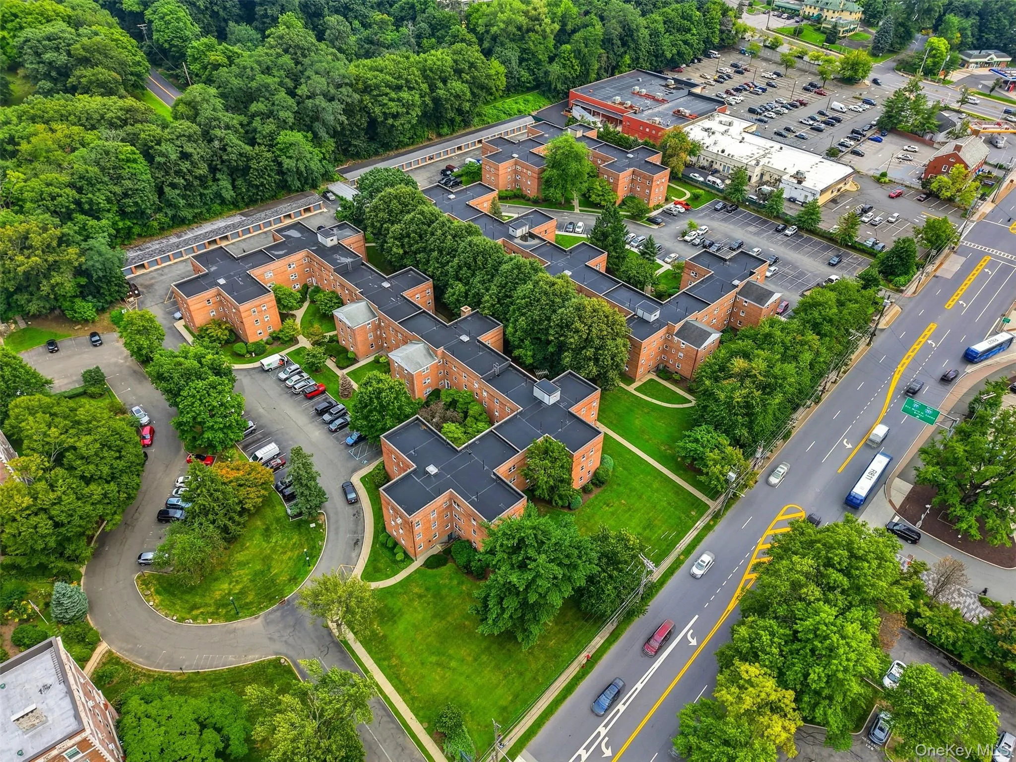 Aerial view showcasing the expansive brick complex and beautifully landscaped grounds along South Broadway. Aerial view showcasing the expansive brick complex and beautifully landscaped grounds along South Broadway.