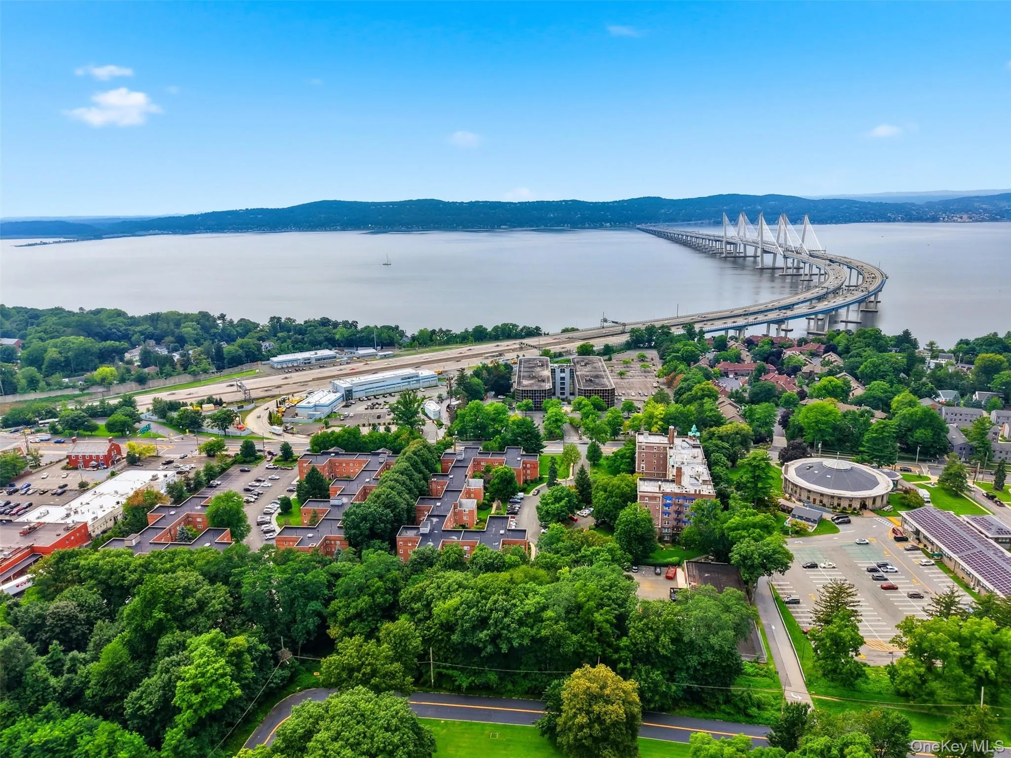 Discover the true scale of this incredible community! This aerial shot perfectly captures the beautifully landscaped grounds, classic brick architecture, and unbeatable proximity to the magnificent Hudson River. Discover the true scale of this incredible community! This aerial shot perfectly captures the beautifully landscaped grounds, classic brick architecture, and unbeatable proximity to the magnificent Hudson River.