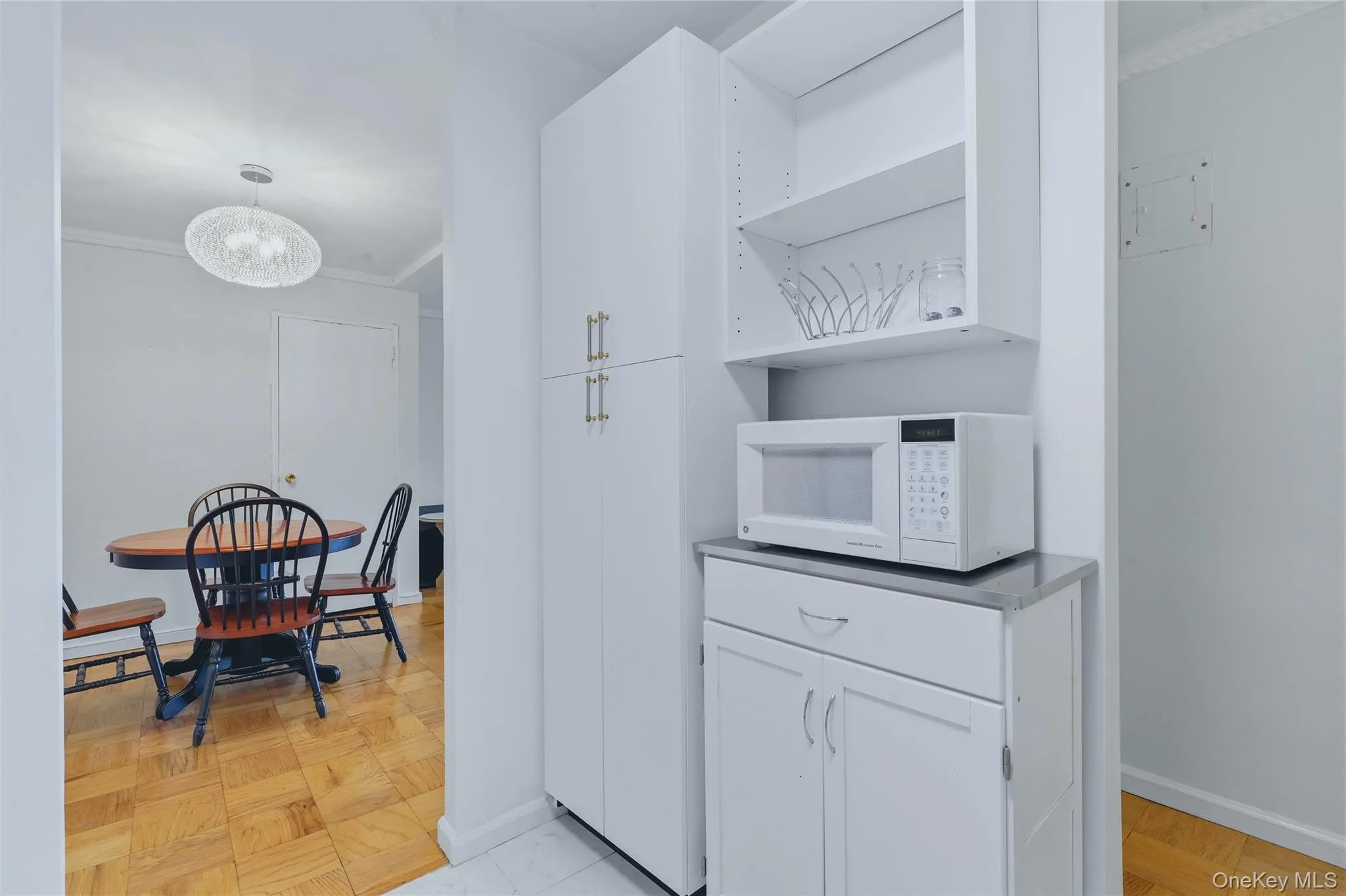 the kitchen opens out into the dining area. the kitchen opens out into the dining area.