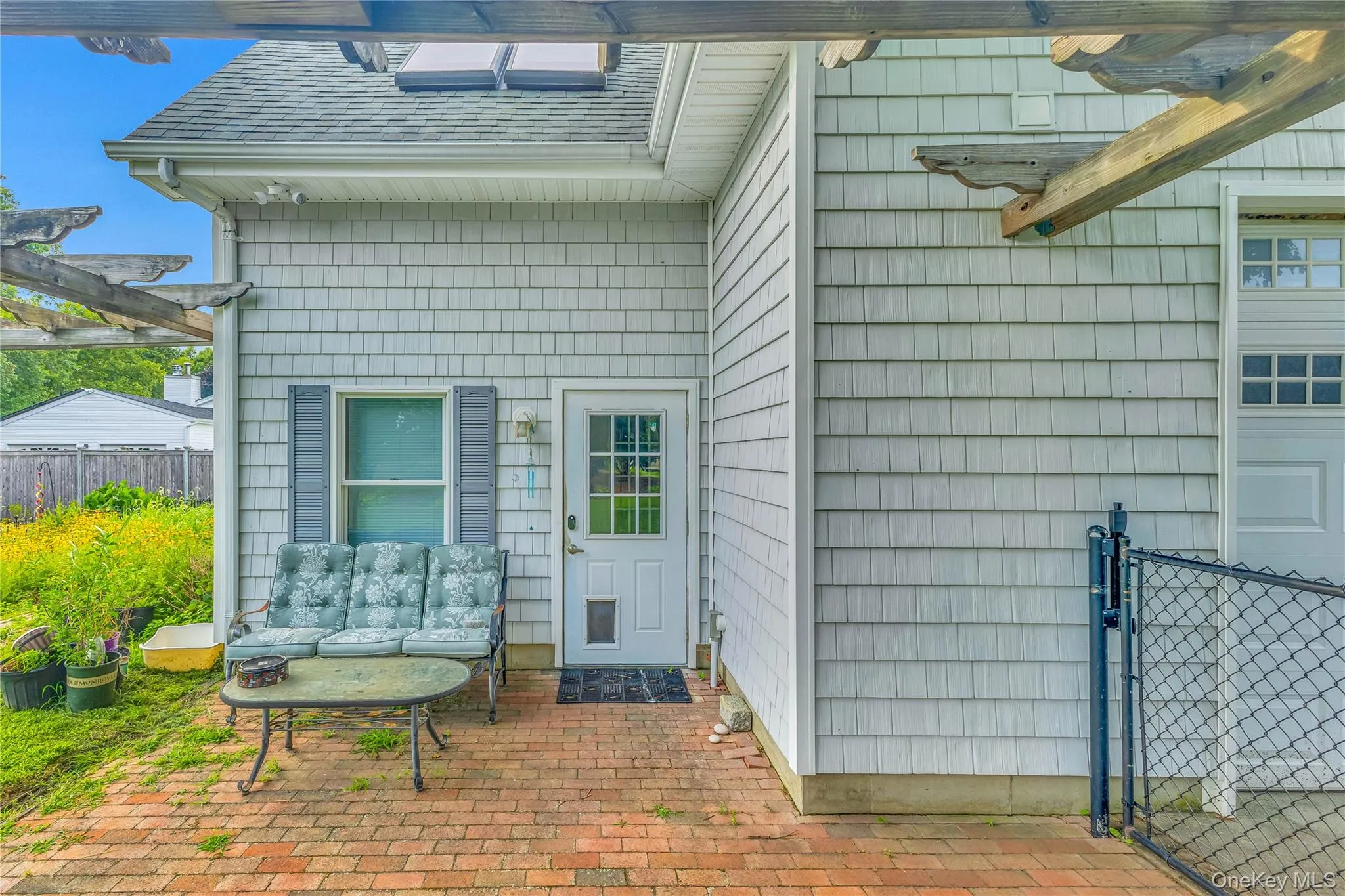 “Rear Entrance for Guest Cottage” — a convenient, private entry designed for easy guest access and seamless arrival. “Rear Entrance for Guest Cottage” — a convenient, private entry designed for easy guest access and seamless arrival.