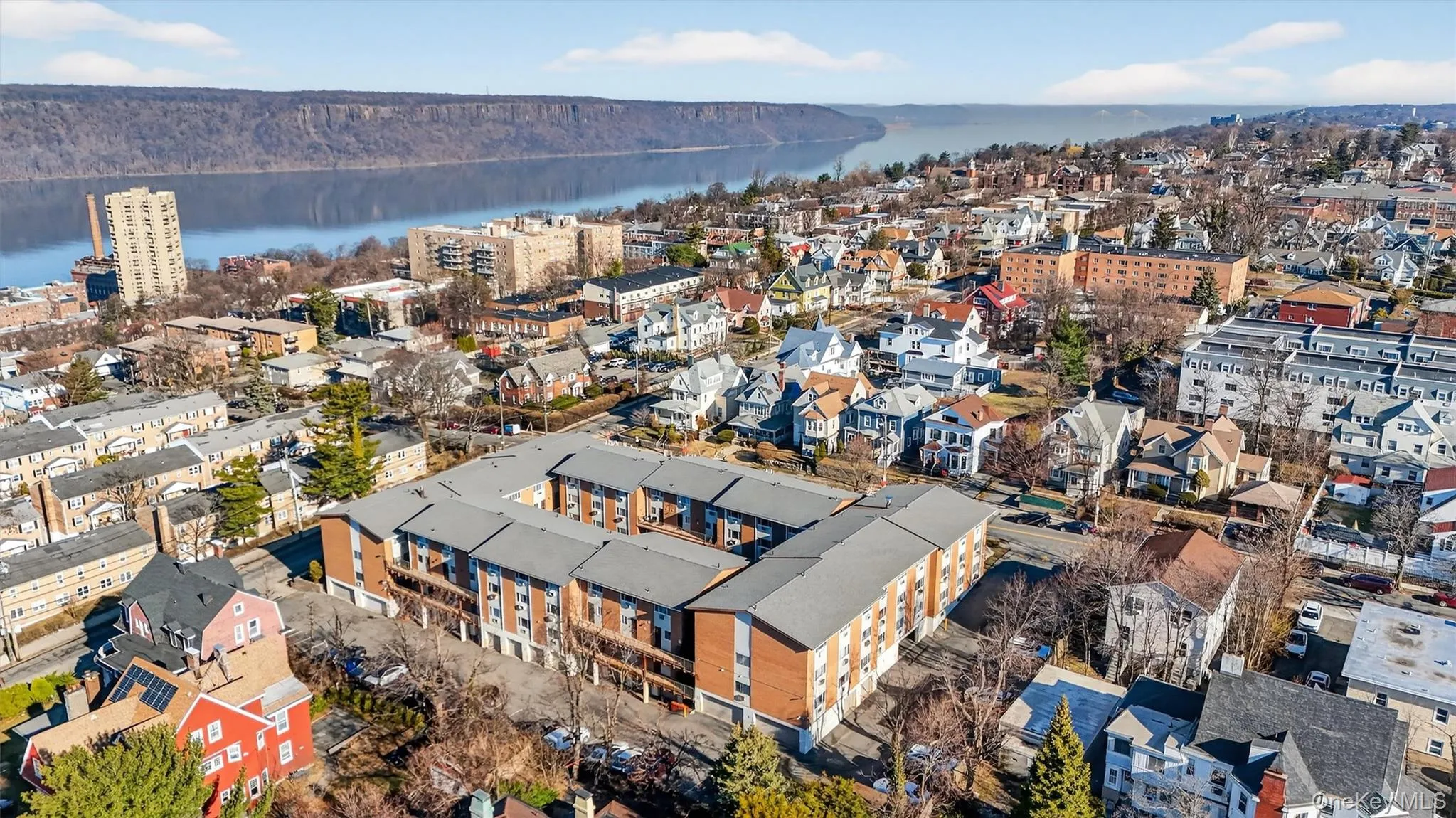 View of urban area with a large body of water View of urban area with a large body of water