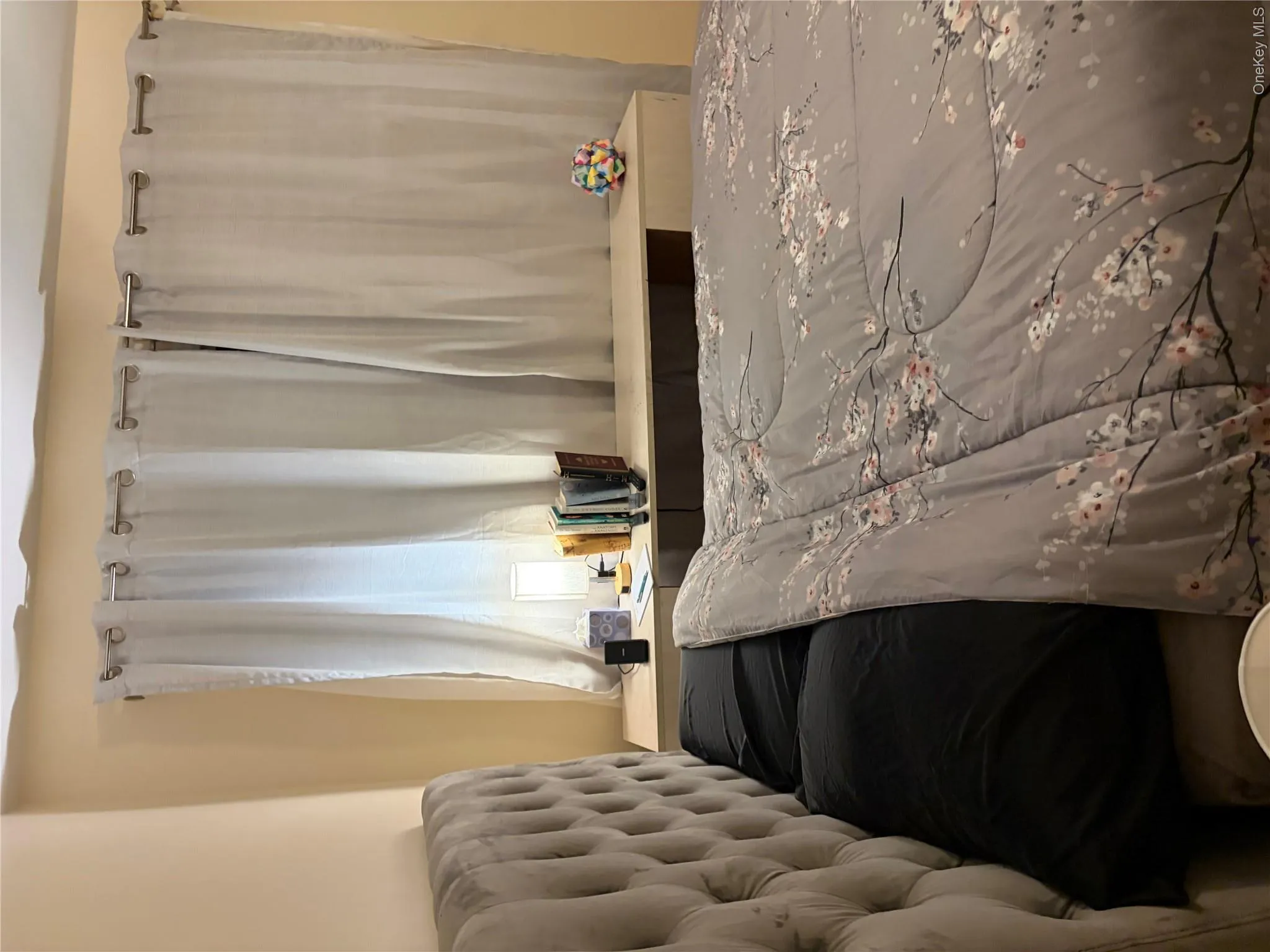 Bedroom with double windows & hardwood flooring. Bedroom with double windows & hardwood flooring.