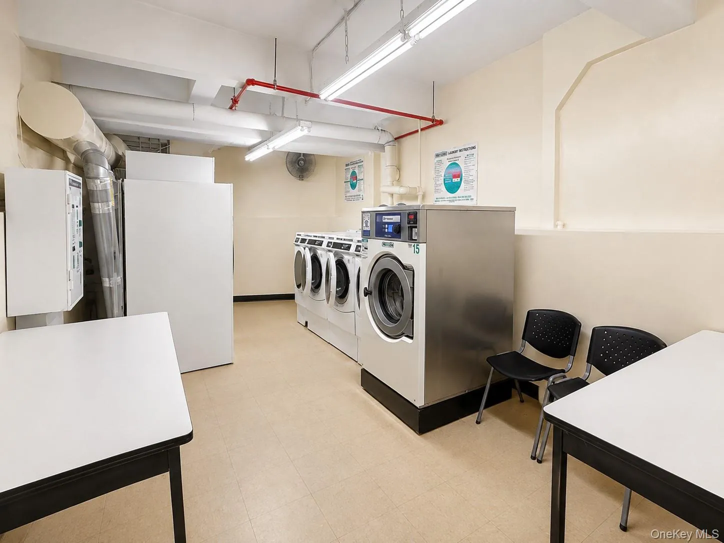 Dedicated laundry facility featuring multiple commercial-grade washers and dryers Dedicated laundry facility featuring multiple commercial-grade washers and dryers
