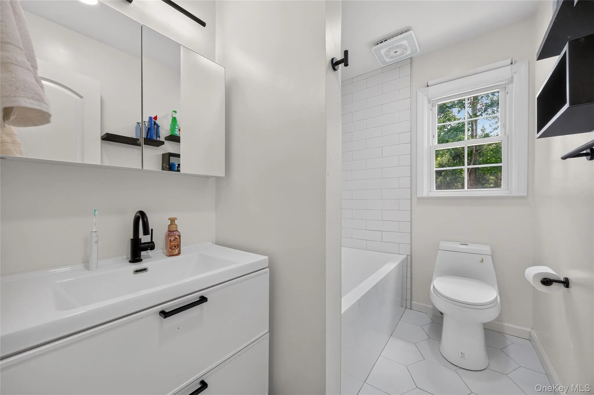 Updated hallway full bathroom Updated hallway full bathroom