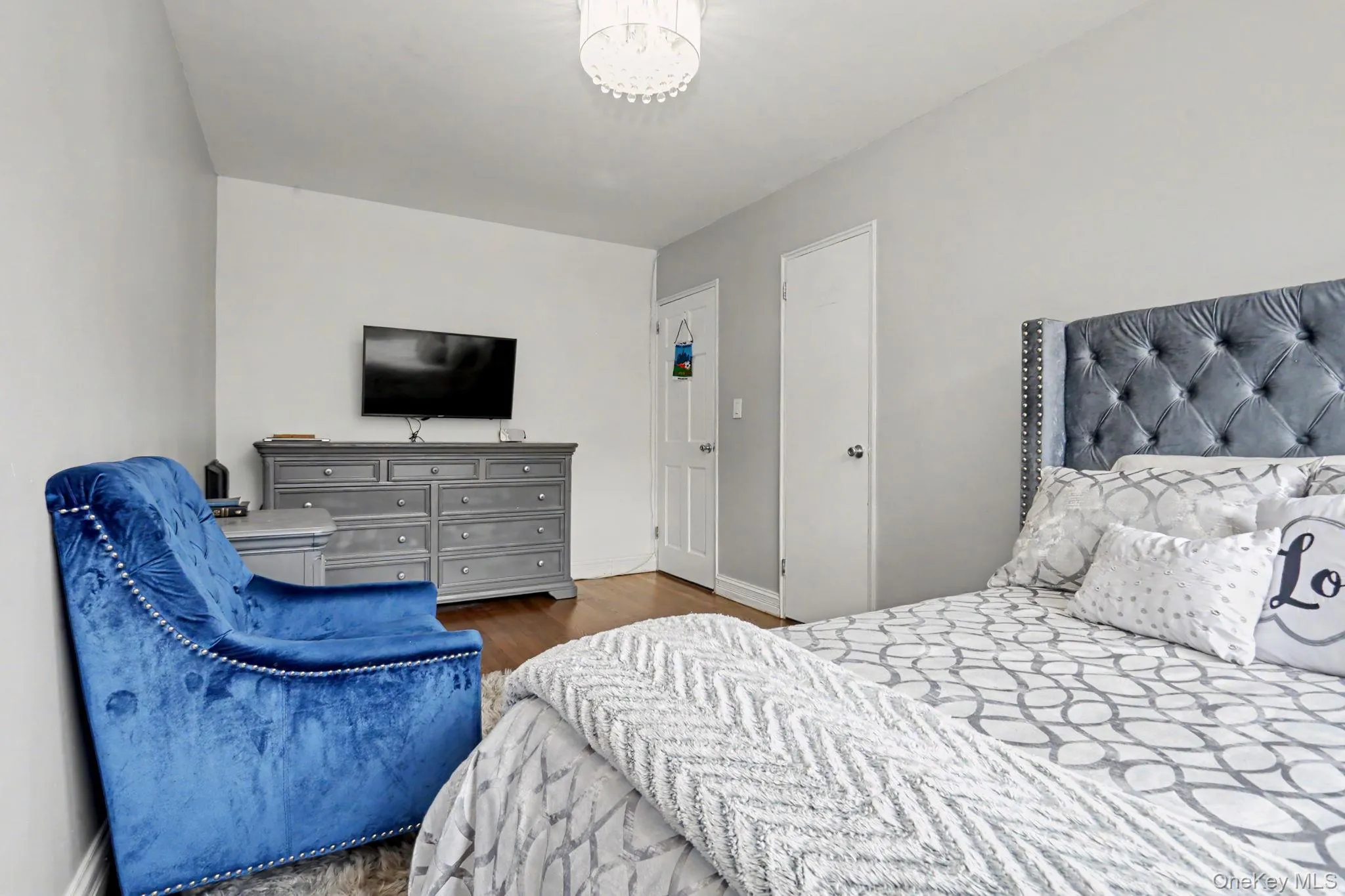 Recessed lighting, wood-finish flooring, and white interior doors Recessed lighting, wood-finish flooring, and white interior doors