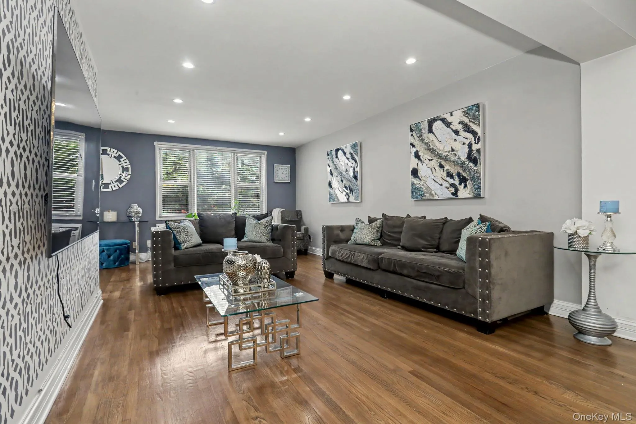 Recessed lighting illuminates wood-finish flooring Recessed lighting illuminates wood-finish flooring