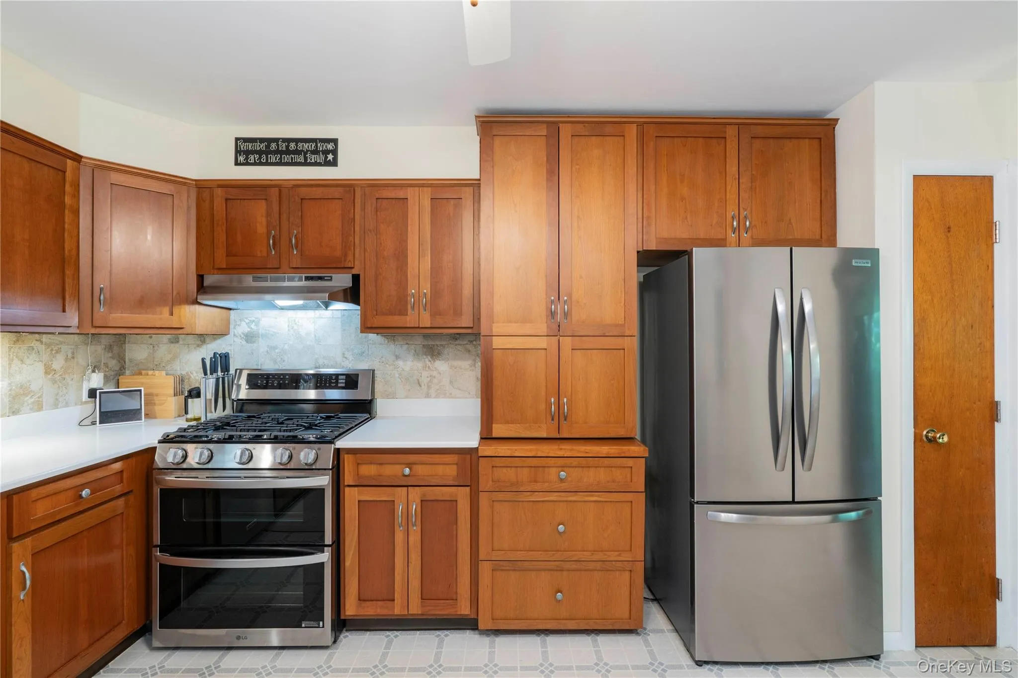Custom cabinetry with quartz countertops Custom cabinetry with quartz countertops