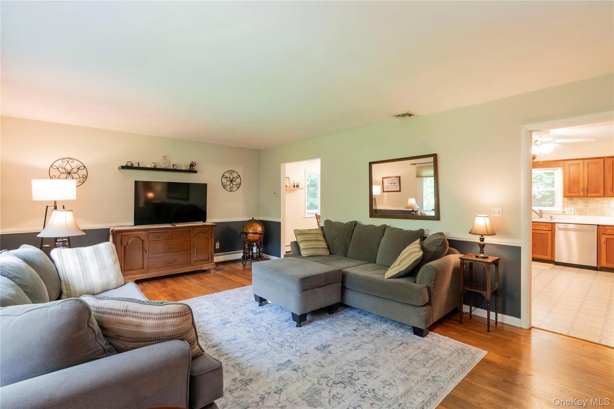 the Living Room opens up to the dining room and also directly into the kitchen the Living Room opens up to the dining room and also directly into the kitchen