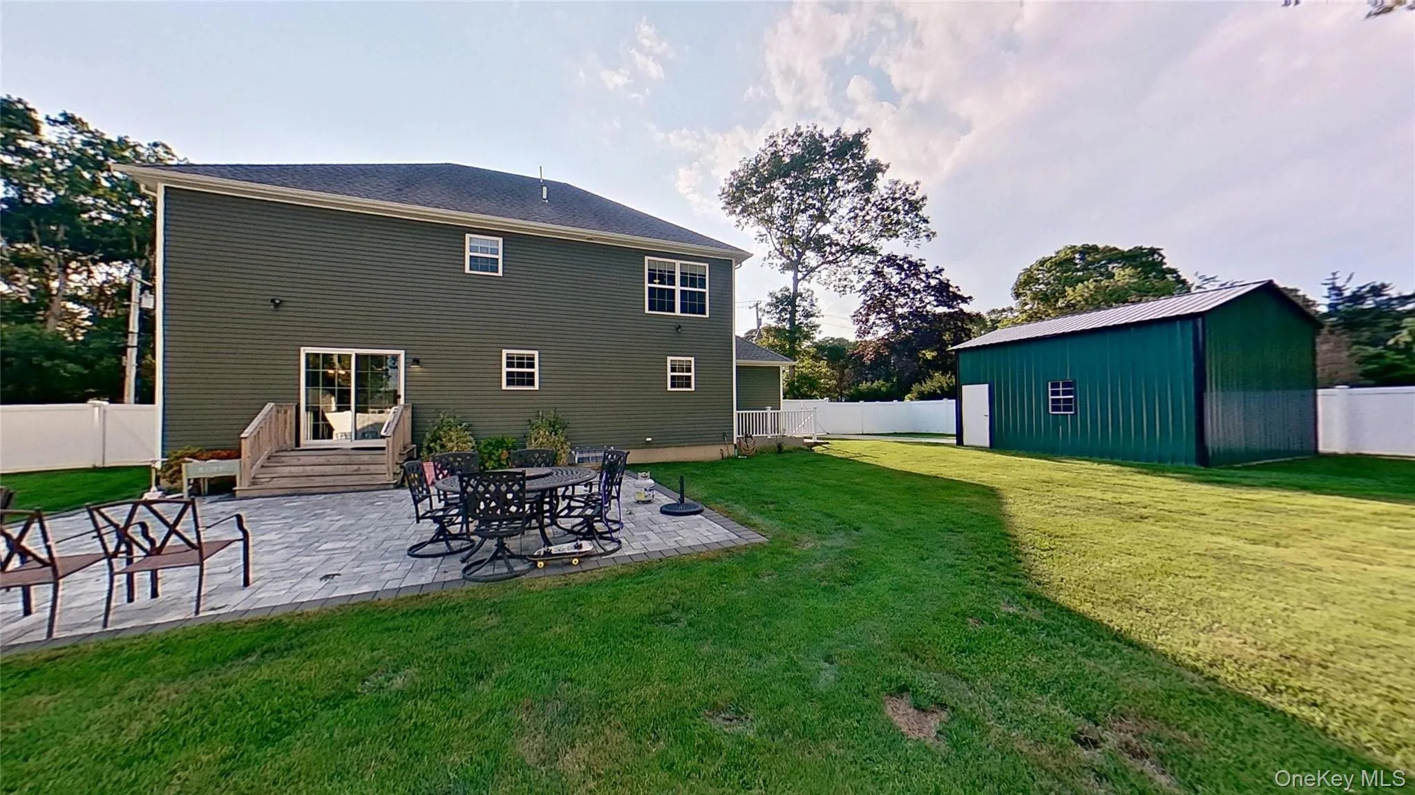 The Patio is large, and so is the detached garage with a high ceiling, garage door, plus a side door and a car lift too! The Patio is large, and so is the detached garage with a high ceiling, garage door, plus a side door and a car lift too!