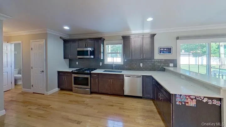 Stainless appliances, Quartz countertops, many cabinets, window views to the backyard, lots of light and conveniently located to all parts of the house! Stainless appliances, Quartz countertops, many cabinets, window views to the backyard, lots of light and conveniently located to all parts of the house!