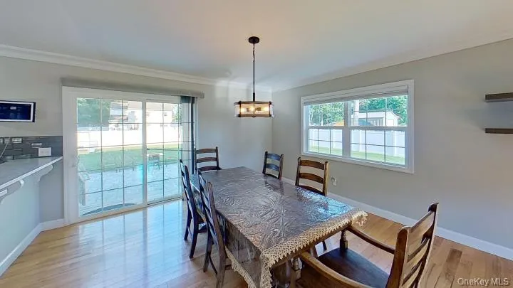 Benefit from a Dining room that welcomes large or small gatherings, as part of this open floorplan with great outside views! Benefit from a Dining room that welcomes large or small gatherings, as part of this open floorplan with great outside views!