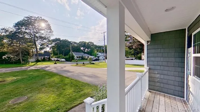 A welcoming covered front porch with PVC railings make this maintenance free home an ideal investment! A welcoming covered front porch with PVC railings make this maintenance free home an ideal investment!