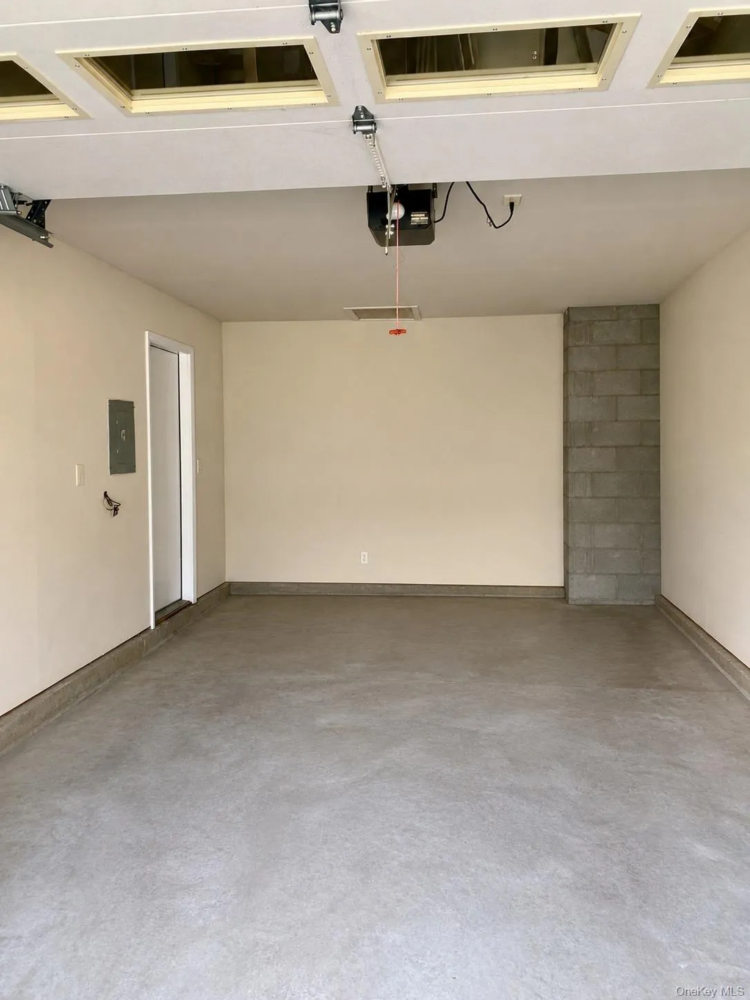 One car garage with storage space. One car garage with storage space.