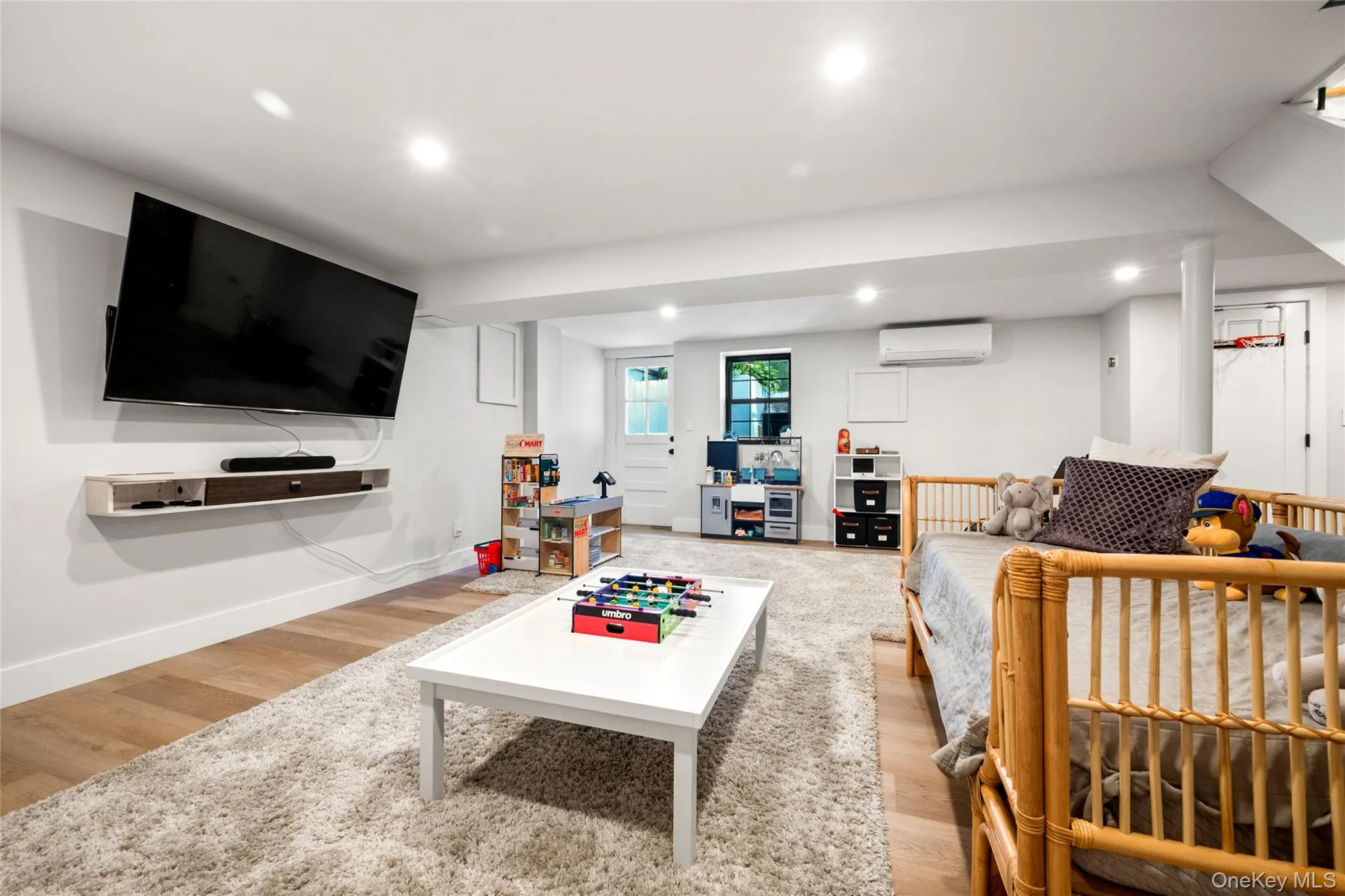 Lower level playroom with walkout to back yard Lower level playroom with walkout to back yard
