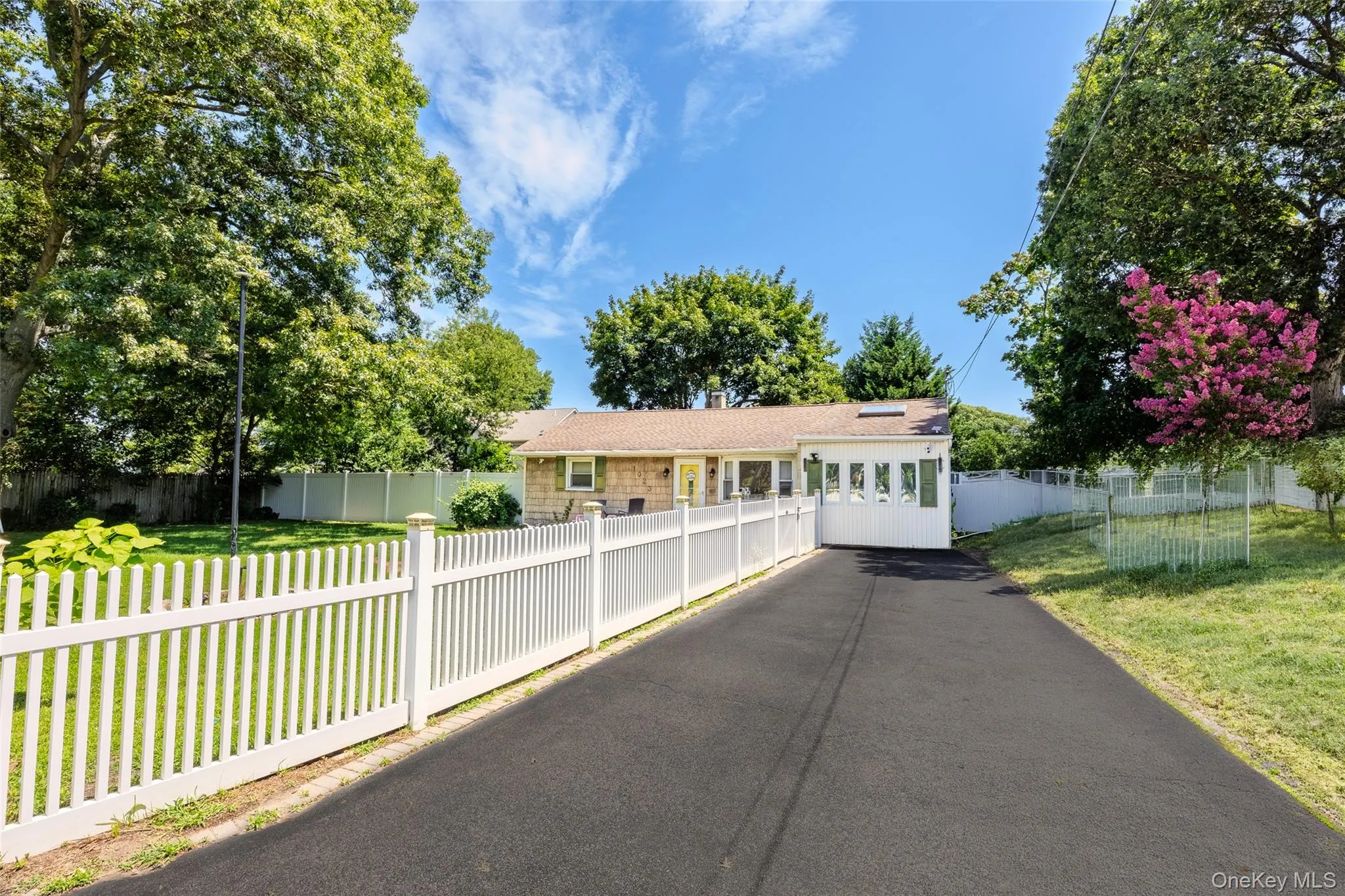 Private driveway fits up to five cars Private driveway fits up to five cars