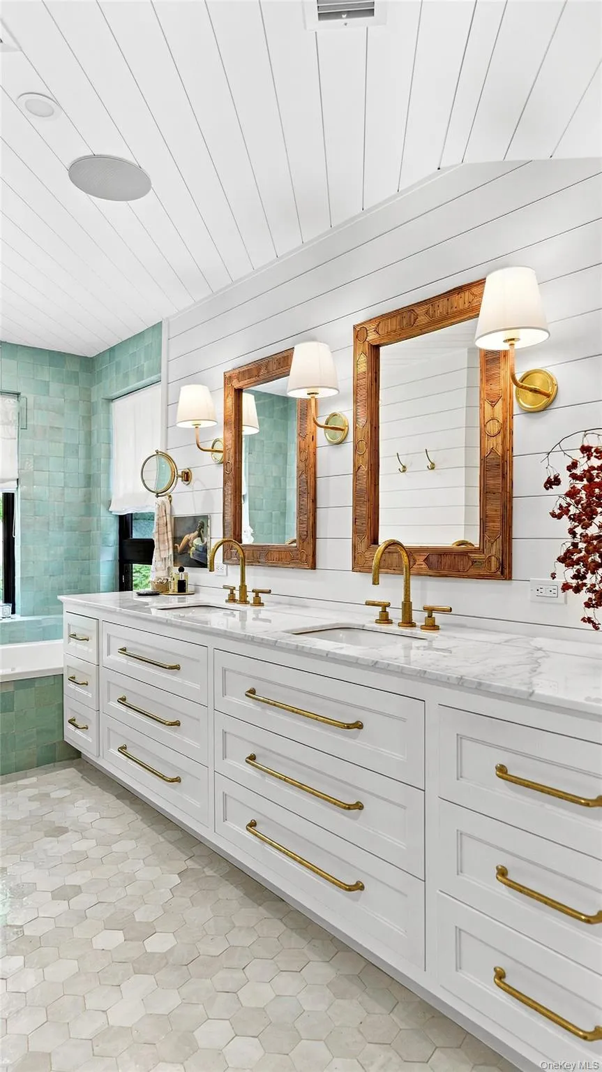 Custom double vanity, abundant storage and carefully selected finishes complete the luxurious primary bath. Custom double vanity, abundant storage and carefully selected finishes complete the luxurious primary bath.