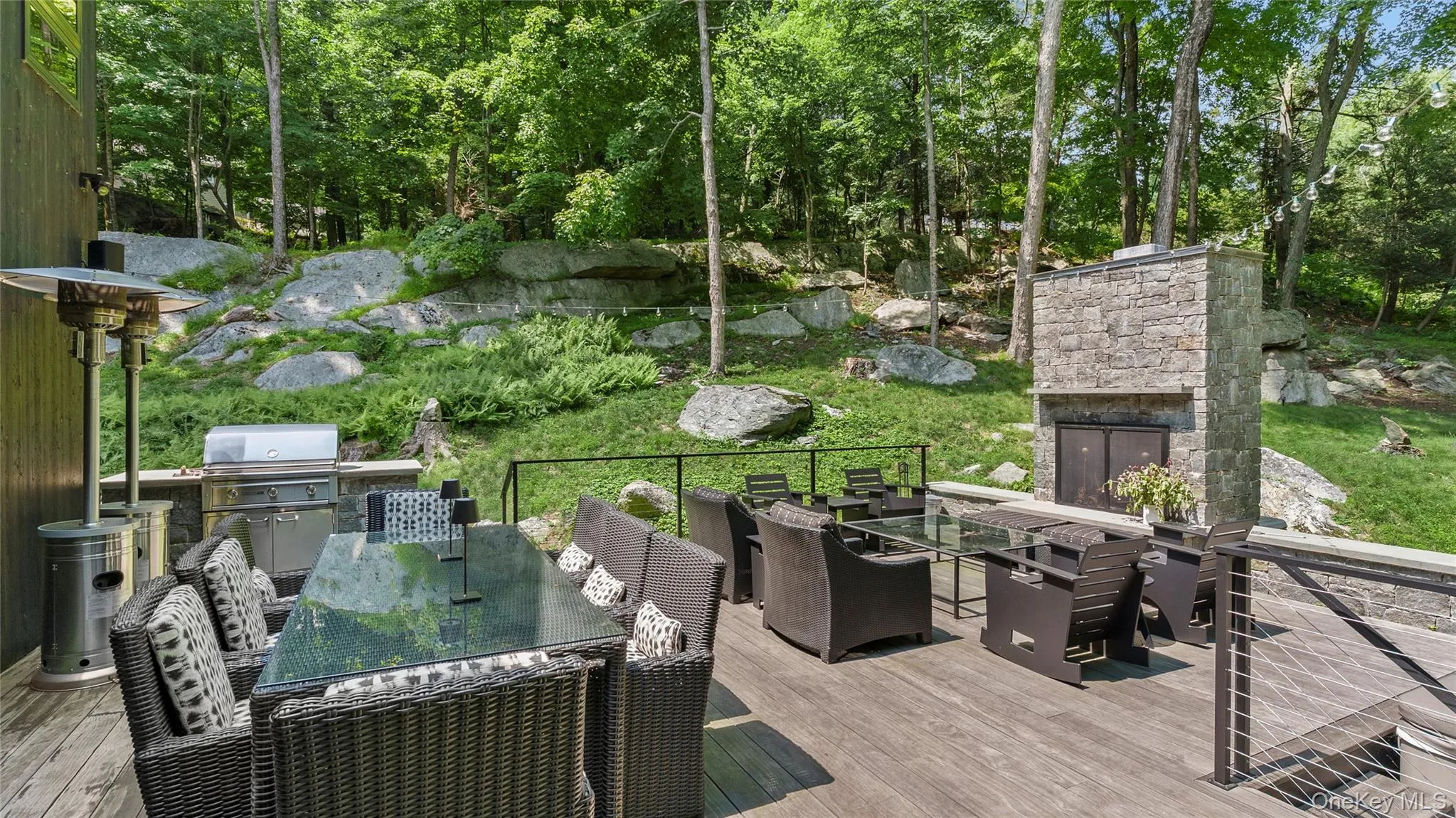 Exceptional outdoor living with expansive Accoya decking, built-in grilling, dining and lounge areas, and a seven-person spa. Exceptional outdoor living with expansive Accoya decking, built-in grilling, dining and lounge areas, and a seven-person spa.
