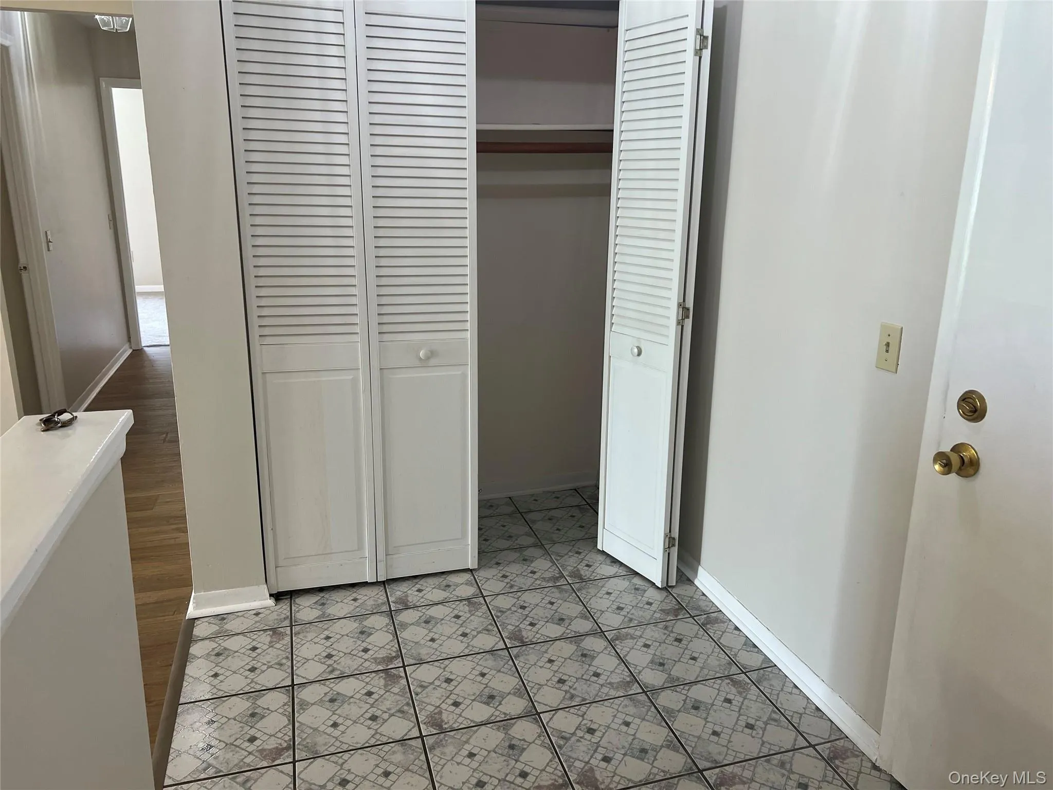 Tile floor, large closet Tile floor, large closet