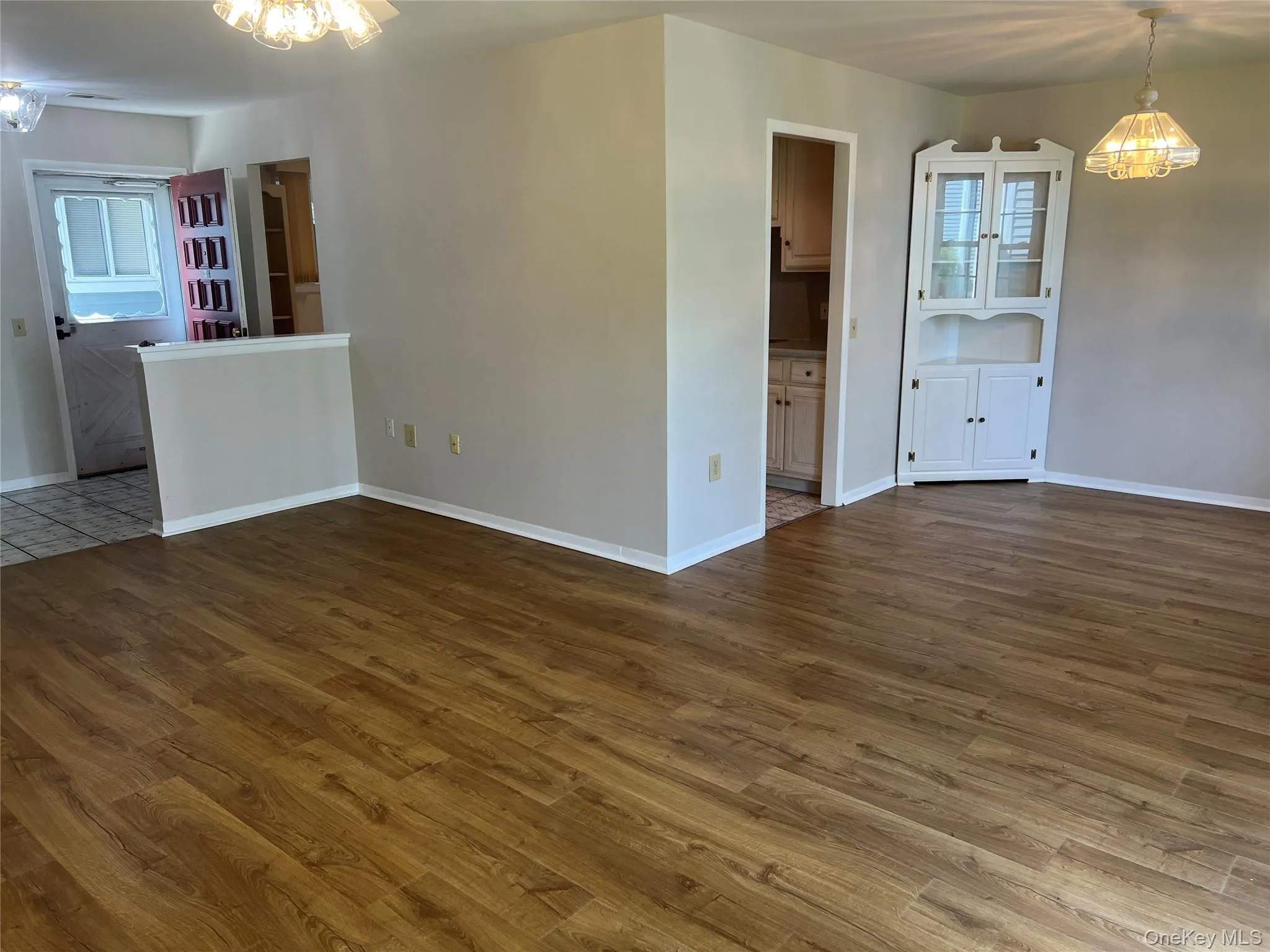 Living/Dining area with new flooring Living/Dining area with new flooring