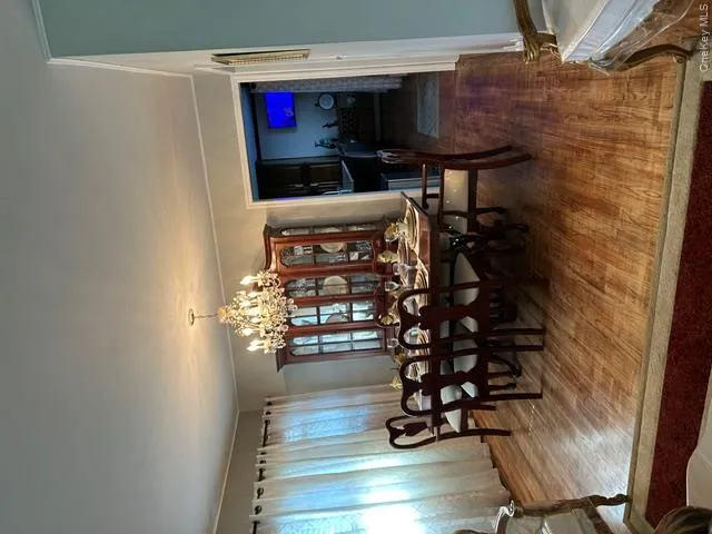 Hardwood flooring throughout the dining area Hardwood flooring throughout the dining area