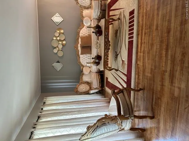 Wood-finish flooring throughout the room Wood-finish flooring throughout the room