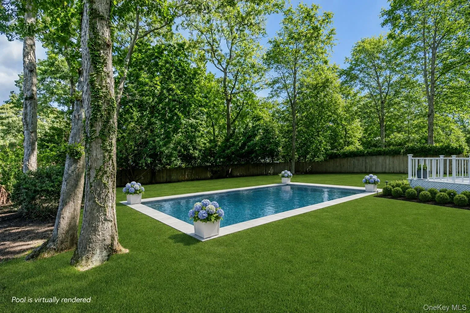 Expansive backyard featuring a rectangular swimming pool with white coping, a surrounding manicured lawn, a white deck with railings, and mature trees providing natural screening Expansive backyard featuring a rectangular swimming pool with white coping, a surrounding manicured lawn, a white deck with railings, and mature trees providing natural screening
