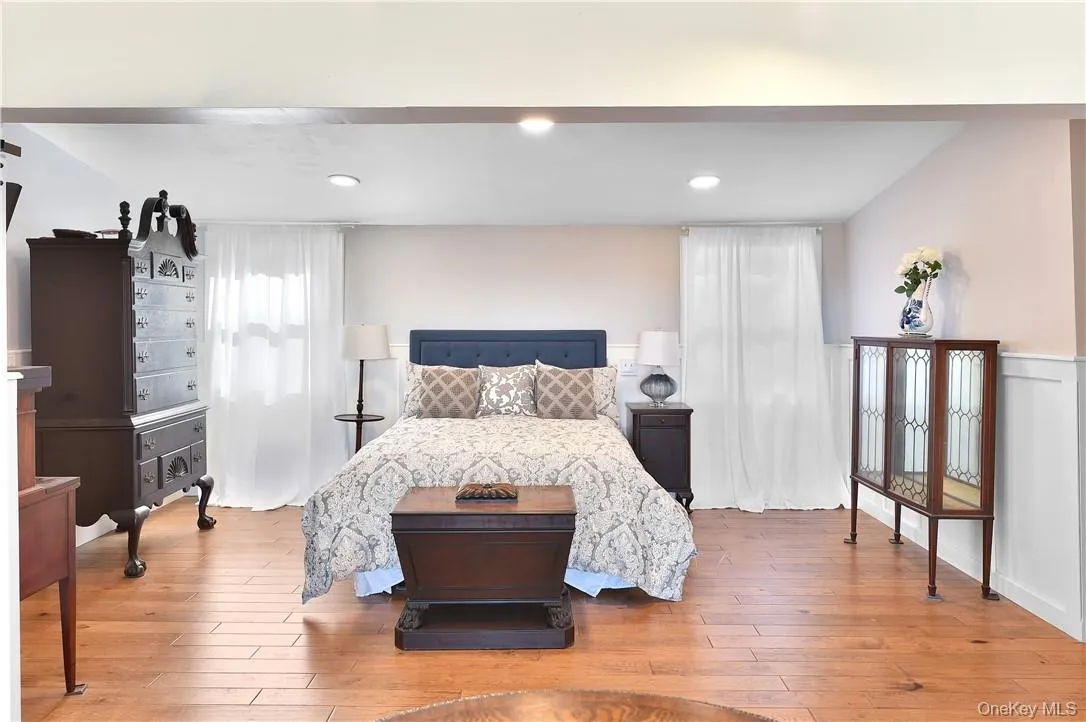 Bedroom with hardwood / wood-style floors Bedroom with hardwood / wood-style floors